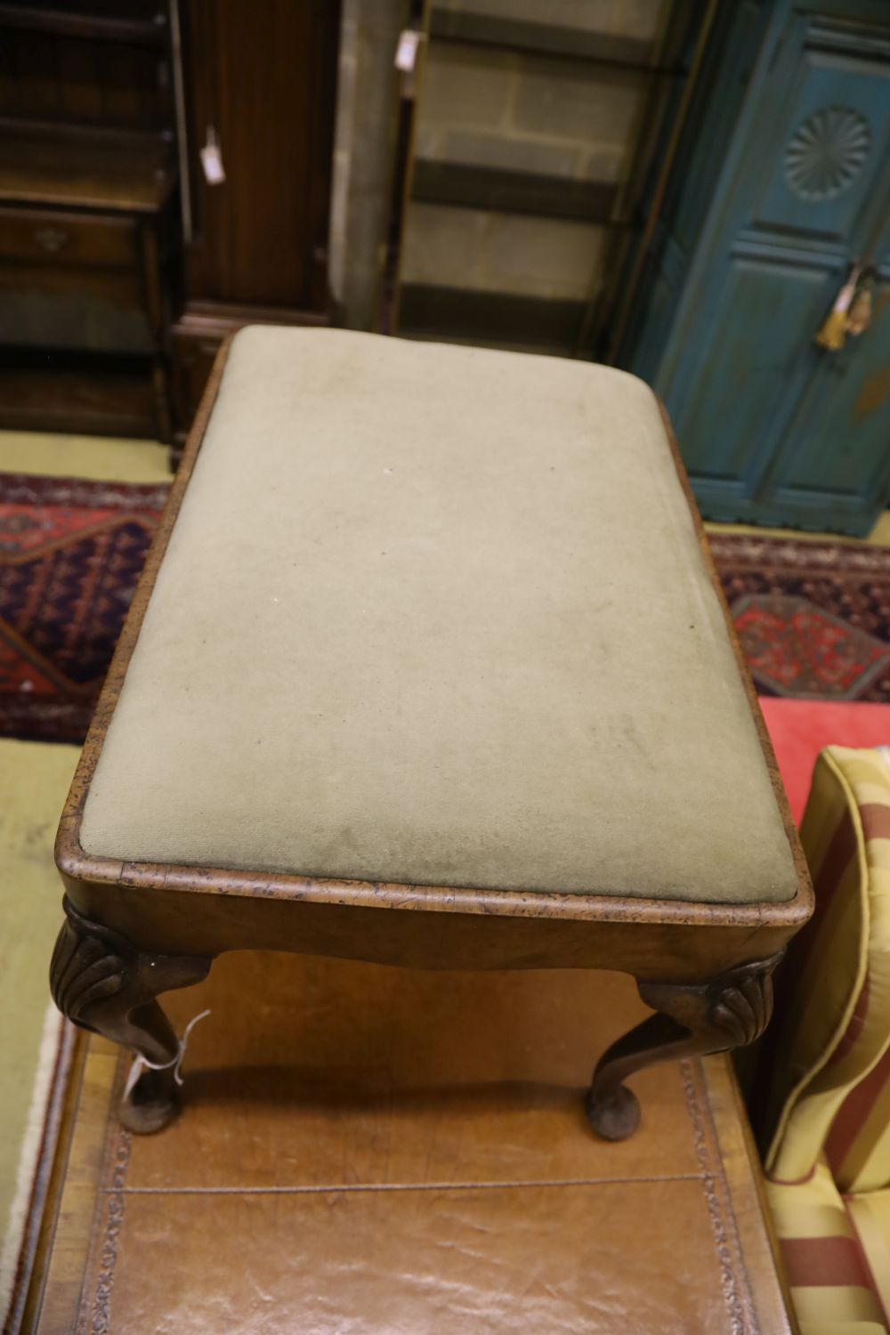 A Queen Anne style walnut dressing stool, width 70cm, depth 52cm, height 48cm